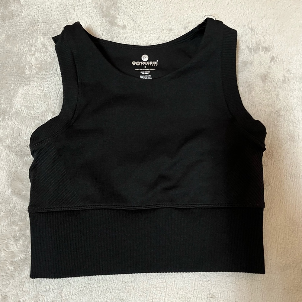 Black athletic sports bra or even can be used at a crop top.